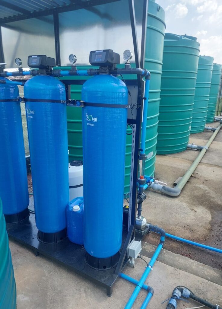 Skid-mounted borehole treatment vessels for Krugersdorp High School, with pressure gauges and control valves on the pipework